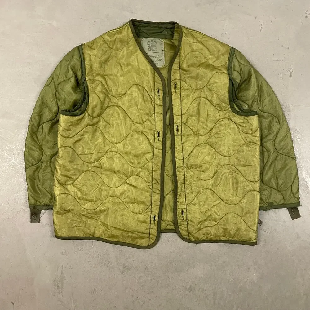 vintage men’s 90s green textured military liner quilted jacket
